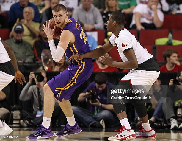 Seth Tuttle of the UNI Panthers in action against Jaylen Johnson of the Louisville Cardinals during the third round of the 2015 Men's NCAA Basketball...