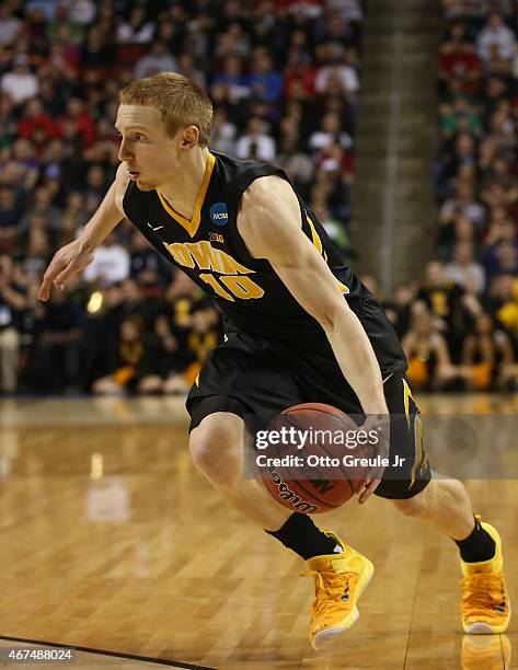 Mike Gesell of the Iowa Hawkeyes in action against the Gonzaga Bulldogs during the third round of the 2015 Men's NCAA Basketball Tournament at Key...