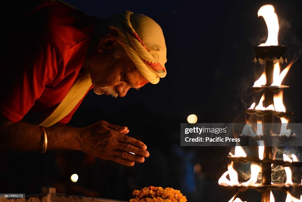 Priest offer evening prayer during Navratri Festival...