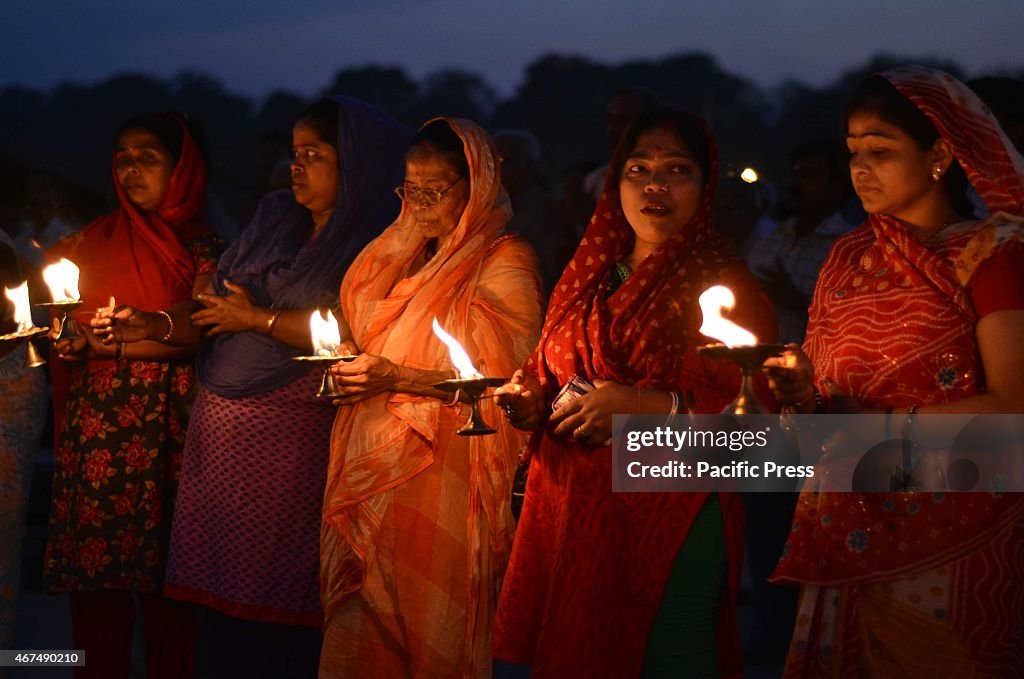 Devotees offer evening prayers during Navratri Festival...