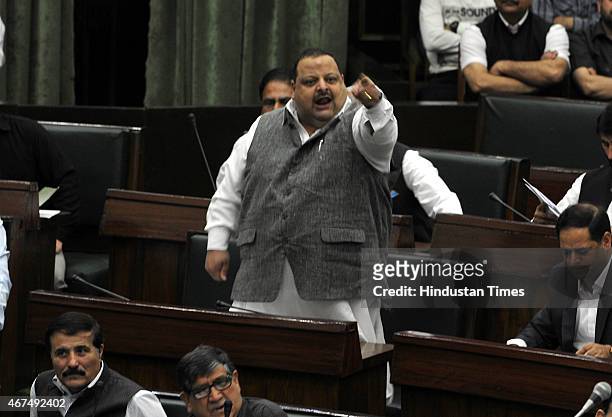 National Conference MLA Davinder Singh Rana arguing with Independent MLA Abdul Rashid during a Budget session on March 25, 2015 in Jammu, India. Last...