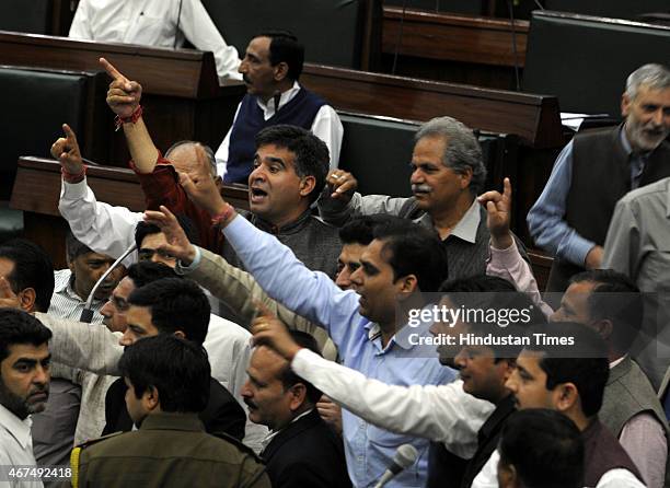 MLAs protesting against National conference MLA Javed Rana remarks against the speaker Kavinder Gupta during a Budget session on March 25, 2015 in...