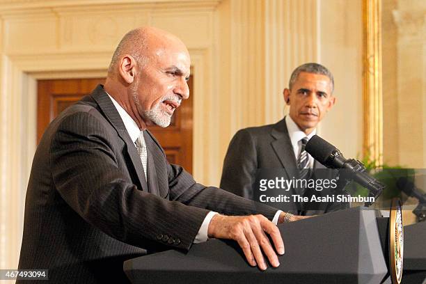 President Barack Obama listens to Afghan President Ashram Ghani speak during a news conference in the East Room at the White House in March 24, 2015...