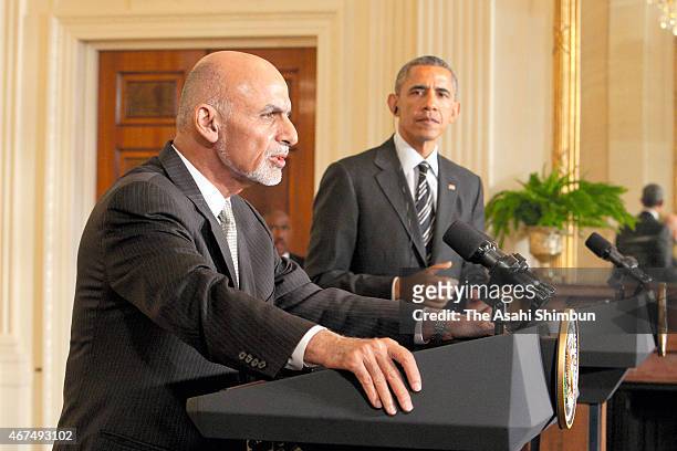 President Barack Obama listens to Afghan President Ashram Ghani speak during a news conference in the East Room at the White House in March 24, 2015...