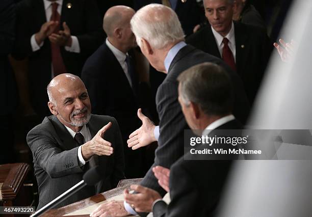 Afghanistan's President Ashraf Ghani greets U.S. Vice President Joe Biden and Speaker of the House John Boehner before delivering an address to a...