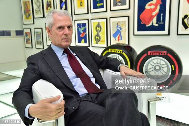 Chairman and Chief Executive Officer of Pirelli & C. S.p.A. Marco Tronchetti Provera poses at the end of an interview at the Pirelli headquarter in...