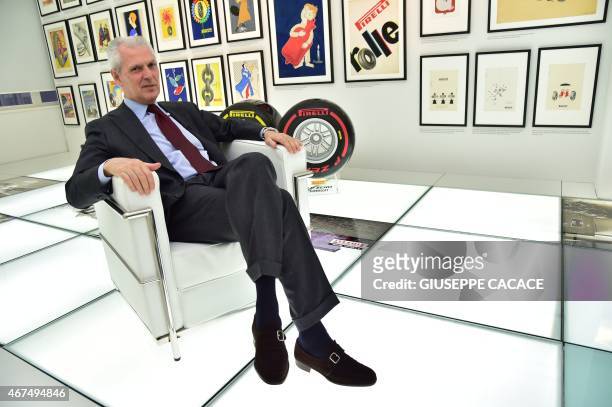 Chairman and Chief Executive Officer of Pirelli & C. S.p.A. Marco Tronchetti Provera poases at the end of an interview at the Pirelli headquarter in...