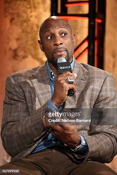 American retired professional basketball player Alonzo Mourning discusses March Madness at AOL Studios in New York on March 25, 2015 in New York City.