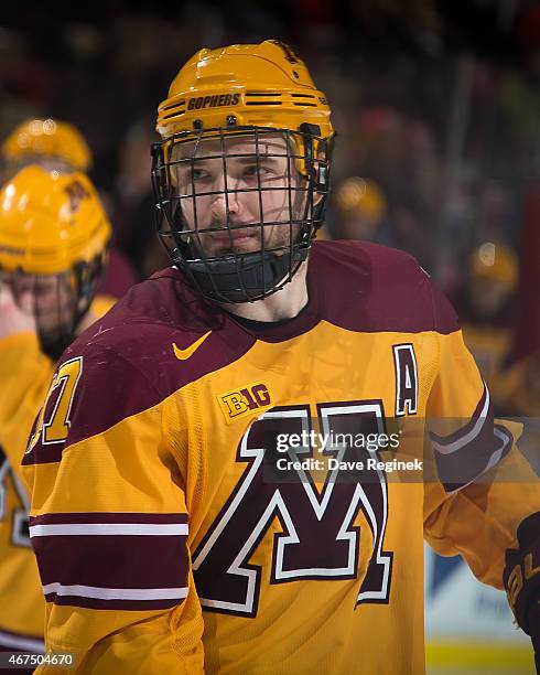 Seth Ambroz of the Minnesota Golden Gophers looks down the ice against the Michigan Wolverines during the finals of Big Ten Mens Ice Hockey...