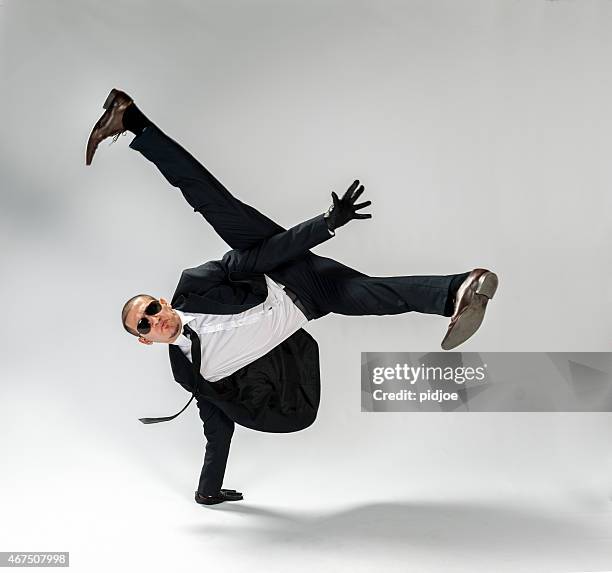 cool looking,breakdancing businessman, free run - black suit sunglasses stock pictures, royalty-free photos & images