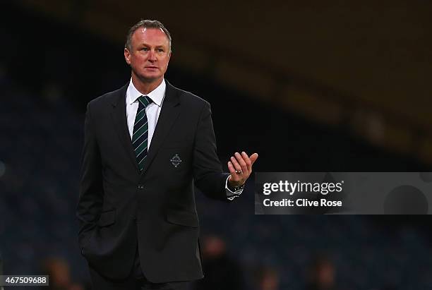 Michael O'Neill manager of Northern Ireland signals during the international friendly match between Scotland and Northern Ireland at Hampden Park on...