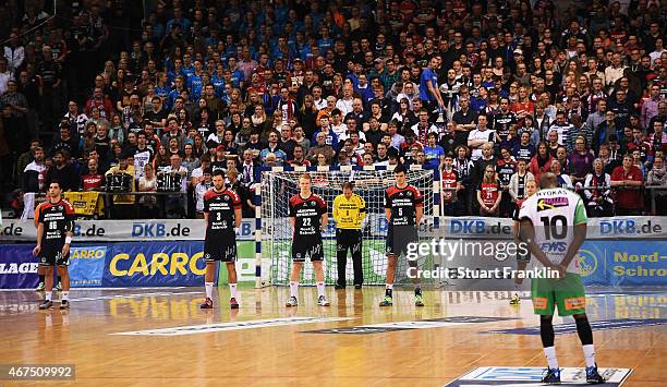 The players and fans of Flensburg and Goeppingen share a minutes silence in rememberance of the German wing plan that crashed killing 150 people...