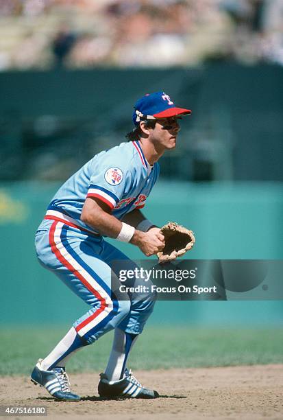 Bucky Dent of the Texas Rangers is down and ready to make a play on the ball against the Baltimore Orioles during an Major League Baseball game circa...