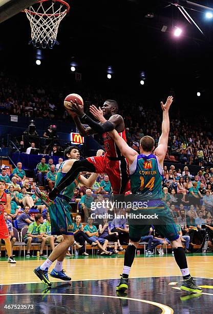 James Ennis of the Wildcats attempts a layup over Brian Conklin