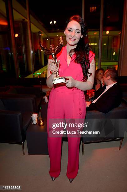 Maria Ehrich poses with her prize during the Jupiter Award at Cafe Moskau on March 25, 2015 in Berlin, Germany.