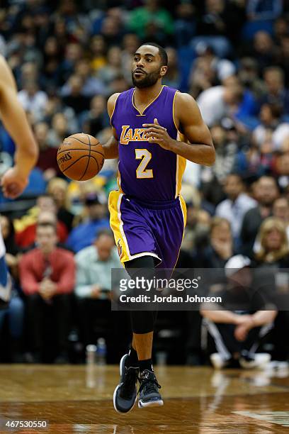 Wayne Ellington of the Los Angeles Lakers dribbles the ball against the Minnesota Timberwolves on March 25, 2015 at Target Center in Minneapolis,...