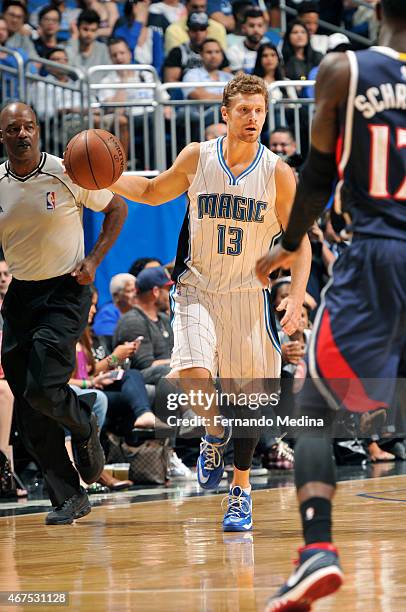 Luke Ridnour of the Orlando Magic looks to move the ball against the Atlanta Hawks during the game on March 25, 2015 at Amway Center in Orlando,...