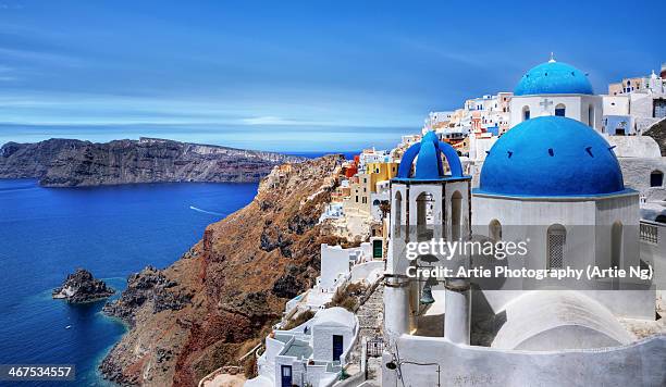 village of oia in santorini, greece - oia santorini stockfoto's en -beelden