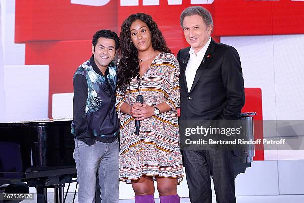 Main guest of the show Humorist Jamel Debbouze, Singer Amel Bent and presenter of the show Michel Drucker attend the 'Vivement Dimanche' French TV...