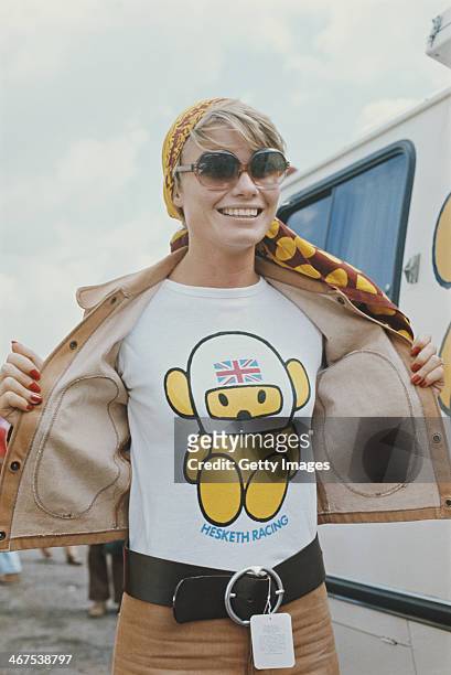 Suzy Miller, wife of James Hunt, driver of the Hesketh Racing Hesketh 308 Ford Cosworth DFV V8 shows her Hesketh Super Bear T shirt during the...