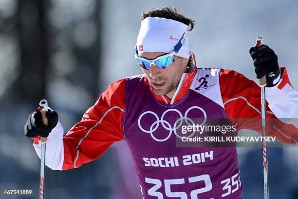 Switzerland's Cross country athlete Curdin Perl trains at the Laura Cross Country Skiing Centre of the Sochi Winter Olympics in Rosa Khutor, near...