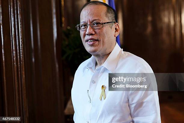 Benigno Aquino, the Philippines' president, poses for a photograph following a Bloomberg Television interview at the Malacanang Palace compound in...