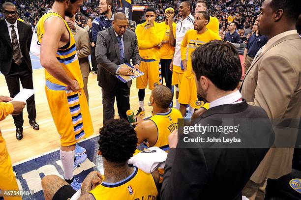 Denver Nuggets head coach Melvin Hunt talks to the the team during a timeout agains the Philadelphia 76ers March 25, 2015 at Pepsi Center.