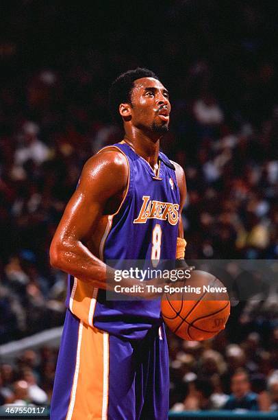 Kobe Bryant of the Los Angeles Lakers shoots a free throw during the game against the Charlotte Hornets on February 2, 2000 at Charlotte Coliseum in...