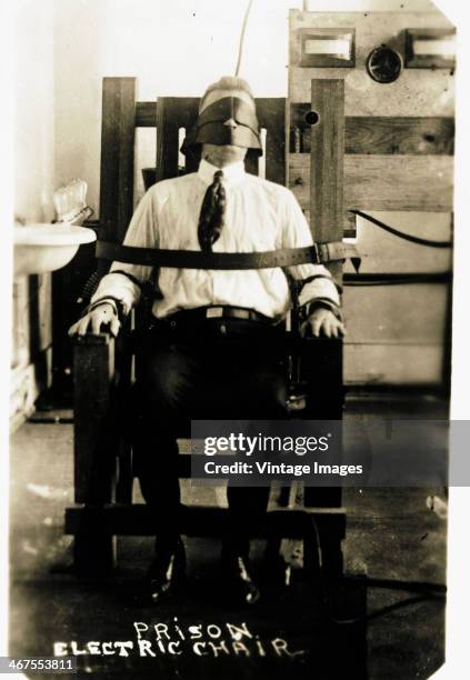 Prisoner in the electric chair, circa 1900.