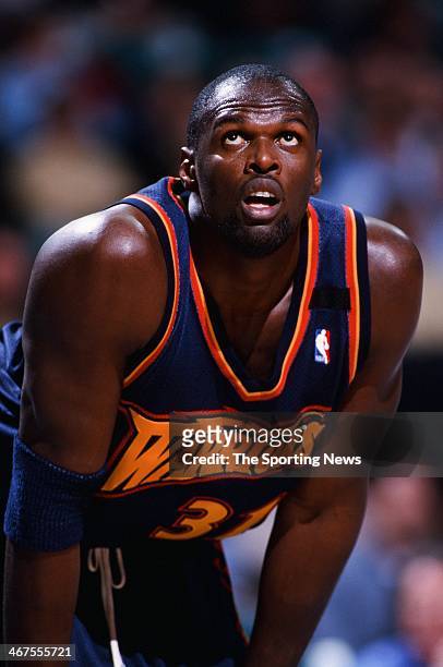 Adonal Foyle of the Golden State Warriors during the game against the Charlotte Hornets on December 8, 1999 at Charlotte Coliseum in Charlotte, North...