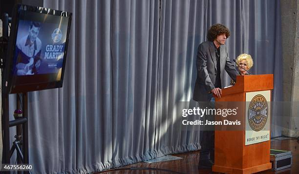 Joshua Martin, son of Grady Martin, speaks after Country Music Hall of Fame Member Brenda Lee announces newcomers into the Hall of Fame during the...