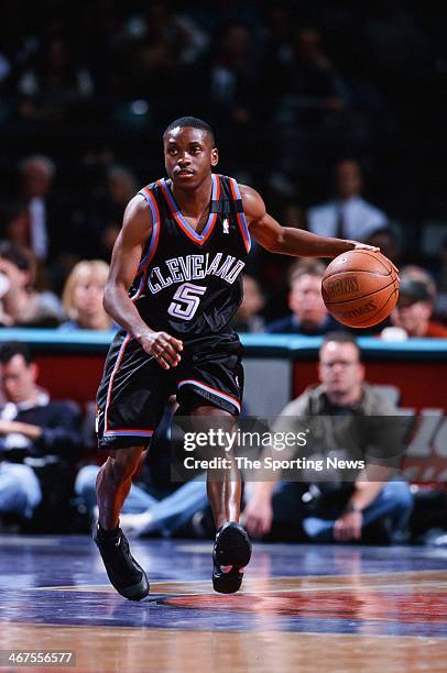 Earl Boykins of the Cleveland Cavaliers moves the ball during the game against the Charlotte Hornets on February 9, 2000 at Charlotte Coliseum in...