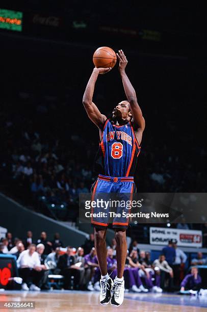 Latrell Sprewell of the New York Knicks takes a jump shot during the game against the Charlotte Hornets on February 7, 2000 at Charlotte Coliseum in...