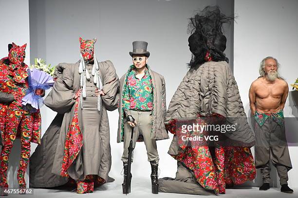 Designer Sheguang Hu shows at the Sheguang Hu show during the Mercedes-Benz China Fashion Week 2015/2016 Autumn/Winter Collection at Central Hall on...