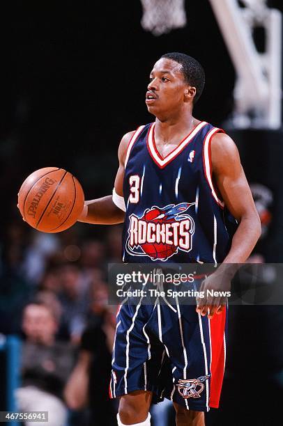 Steve Francis of the Houston Rockets moves the ball during the game against the Charlotte Hornets on February 22, 2000 at Charlotte Coliseum in...