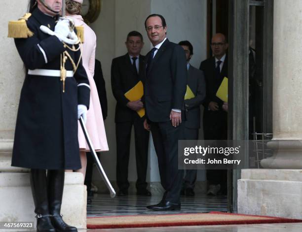 French President Francois Hollande is waiting for King Philippe of Belgium and Queen Mathilde of Belgium during their one day official visit in Paris...