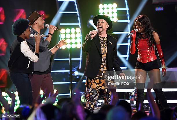 Boy George performs with the contestants onstage at FOX's "American Idol XIV" Top 9 Revealed on March 25, 2015 in Hollywood, California.