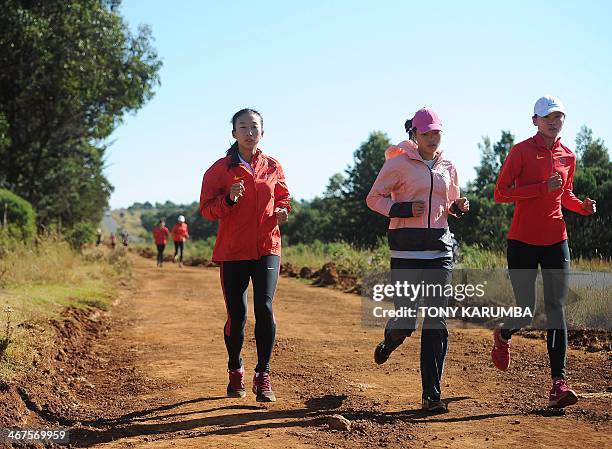 Picture taken on February 3, 2014 shows members of China's national athletics team training in Kenya's renowned high-altitude village of Iten where...