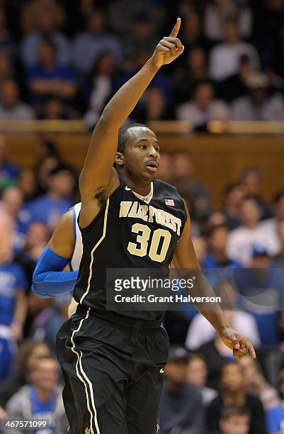 Travis McKie of the Wake Forest Demon Deacons reacts after making a 3-point basket against the Duke Blue Devils during their game at Cameron Indoor...