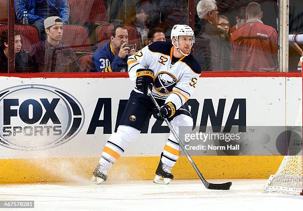 Alexander Sulzer of the Buffalo Sabres skates with the puck against the Phoenix Coyotes at Jobing.com Arena on January 30, 2014 in Glendale, Arizona.