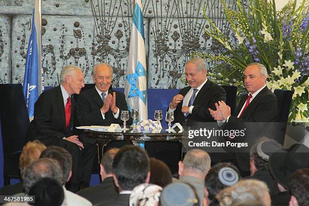 At a ceremony to re-nominate Professor Stanley Fischer to a second term as Governor of the Bank of Israel, Fischer smiles as, from left, Israel...