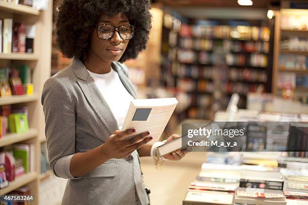 african women at bookstore - bookshop stock pictures, royalty-free photos & images