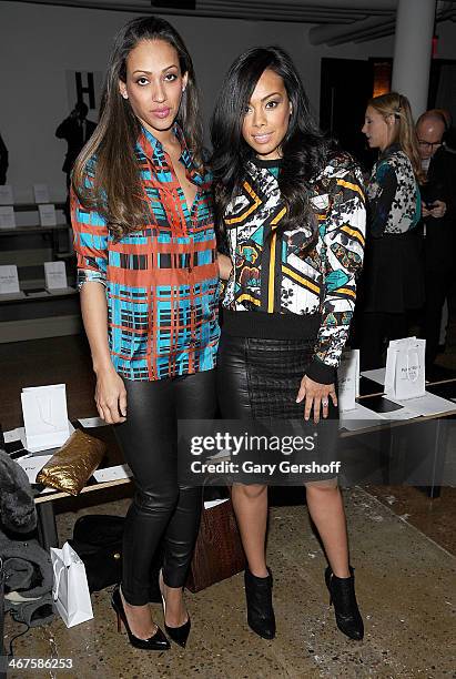 Julie Pierce and Brandi Garnett attend the Peter Som show during MADE Fashion Week Fall 2014 at Milk Studios on February 7, 2014 in New York City.