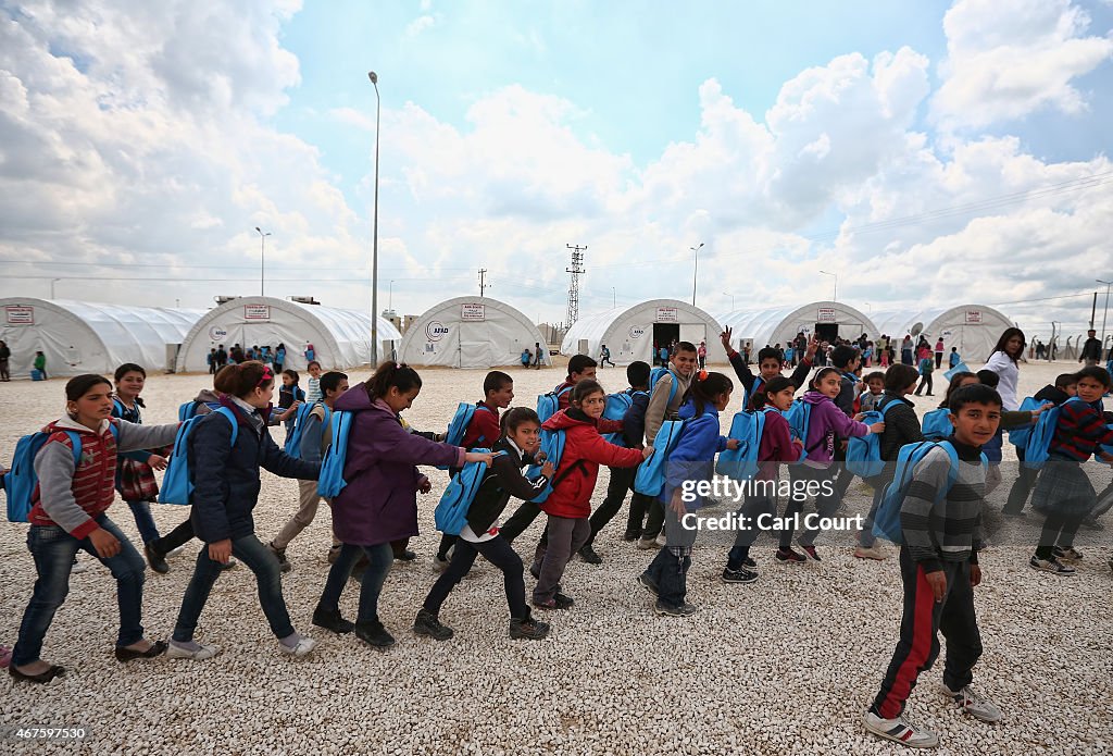 Syrian Refugees Seek Shelter In Turkish Camps