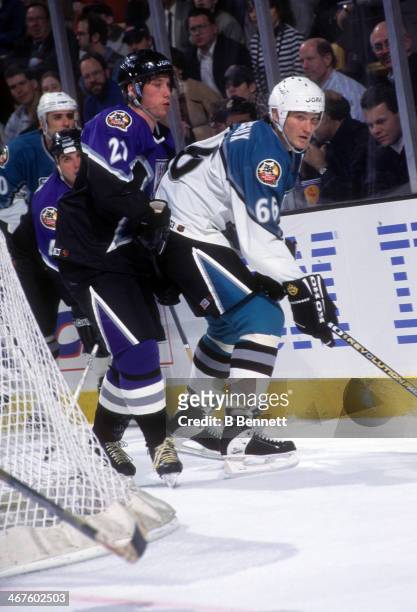 Mario Lemieux of the Eastern Conference and Pittsburgh Penguins is defended by Peter Forsberg of the Western Conference and Colorado Avalanche during...
