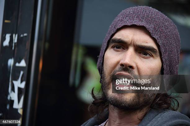 Russell Brand opens the Trew Era Cafe on March 26, 2015 in London, England. The Trew Era Cafe is a social enterprise community project on the New Era...