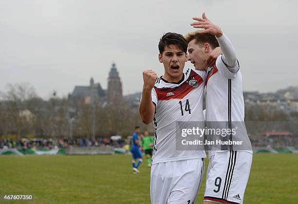 Goerkem Saglam and team mate Johannes Eggestein of Germany celebrate the equalizer 2:2 goal during the UEFA Under17 Elite Round match between U17...