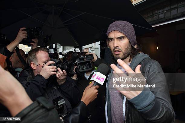 Russell Brand opens the Trew Era Cafe on March 26, 2015 in London, England. The Trew Era Cafe is a social enterprise community project on the New Era...