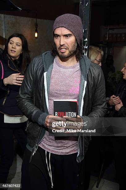 Russell Brand opens the Trew Era Cafe on March 26, 2015 in London, England. The Trew Era Cafe is a social enterprise community project on the New Era...