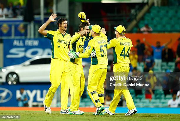 Australia celebrates after winning the 2015 Cricket World Cup Semi Final match between Australia and India at Sydney Cricket Ground on March 26, 2015...